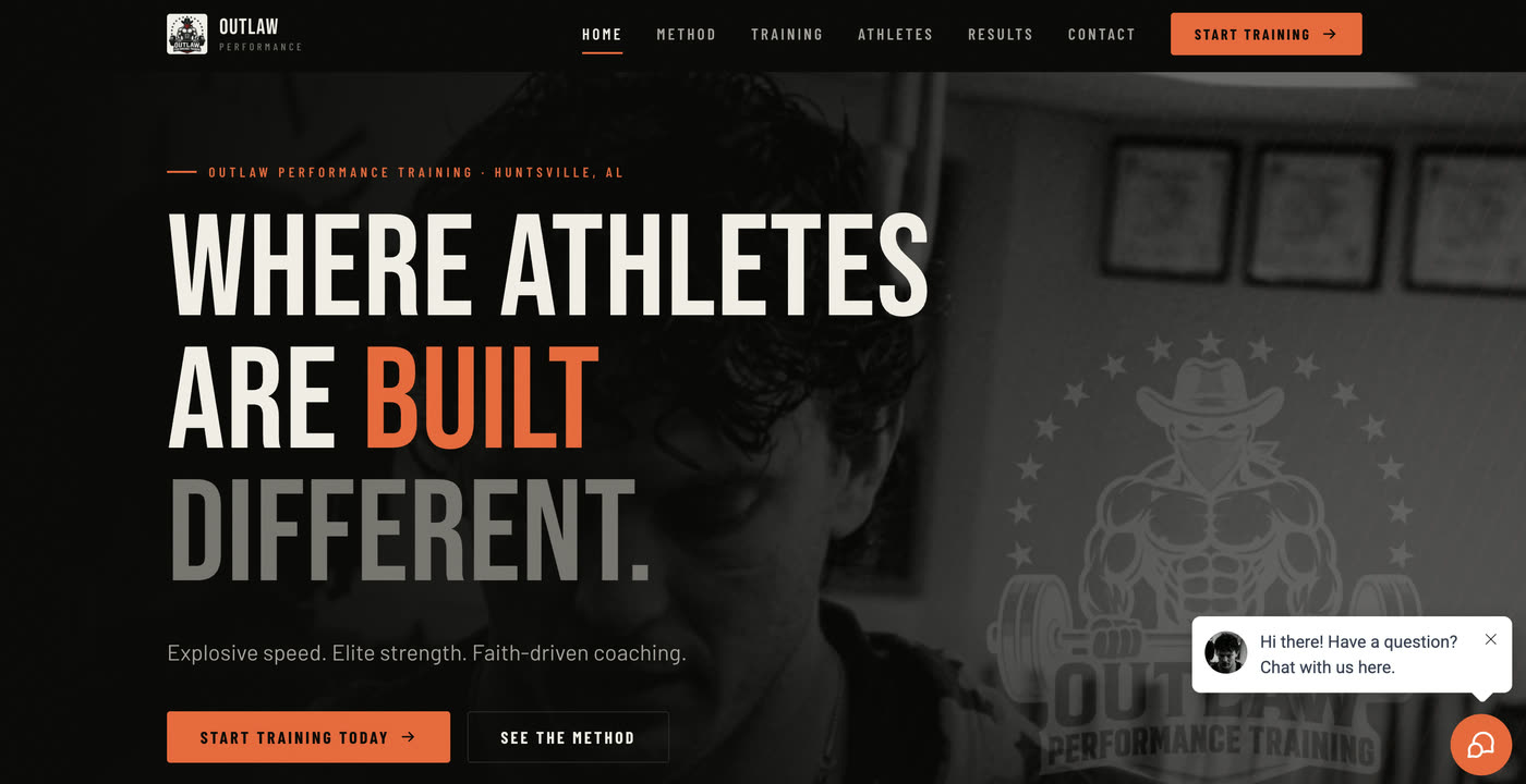 Outlaw Performance home page: the headline &ldquo;Where athletes are built different&rdquo; over a training photograph, with a chat widget open in the corner.